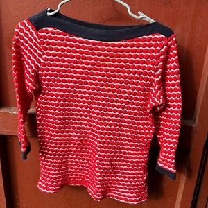 Red, white, dark blue sweater